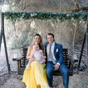 Kayla Bowen Family Photo in the olive grove swing